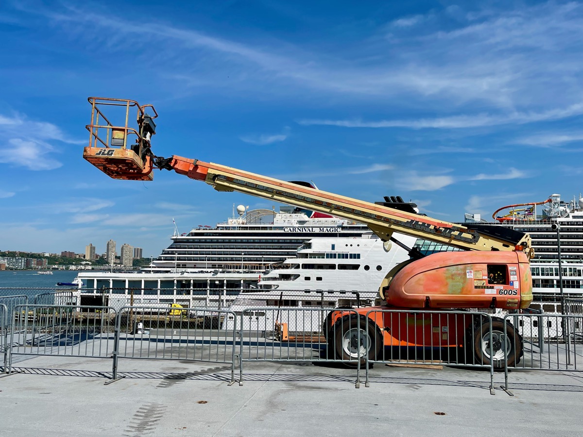 Telescopic boom lift on a job site